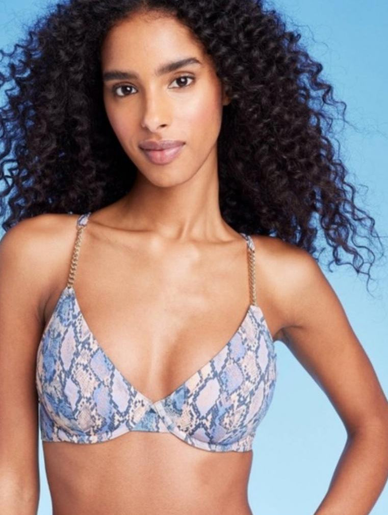 Woman wearing a blue patterned bikini 